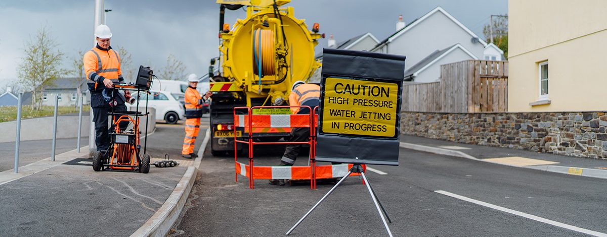 West Wales Waste engineers repairing a broken drain pipe